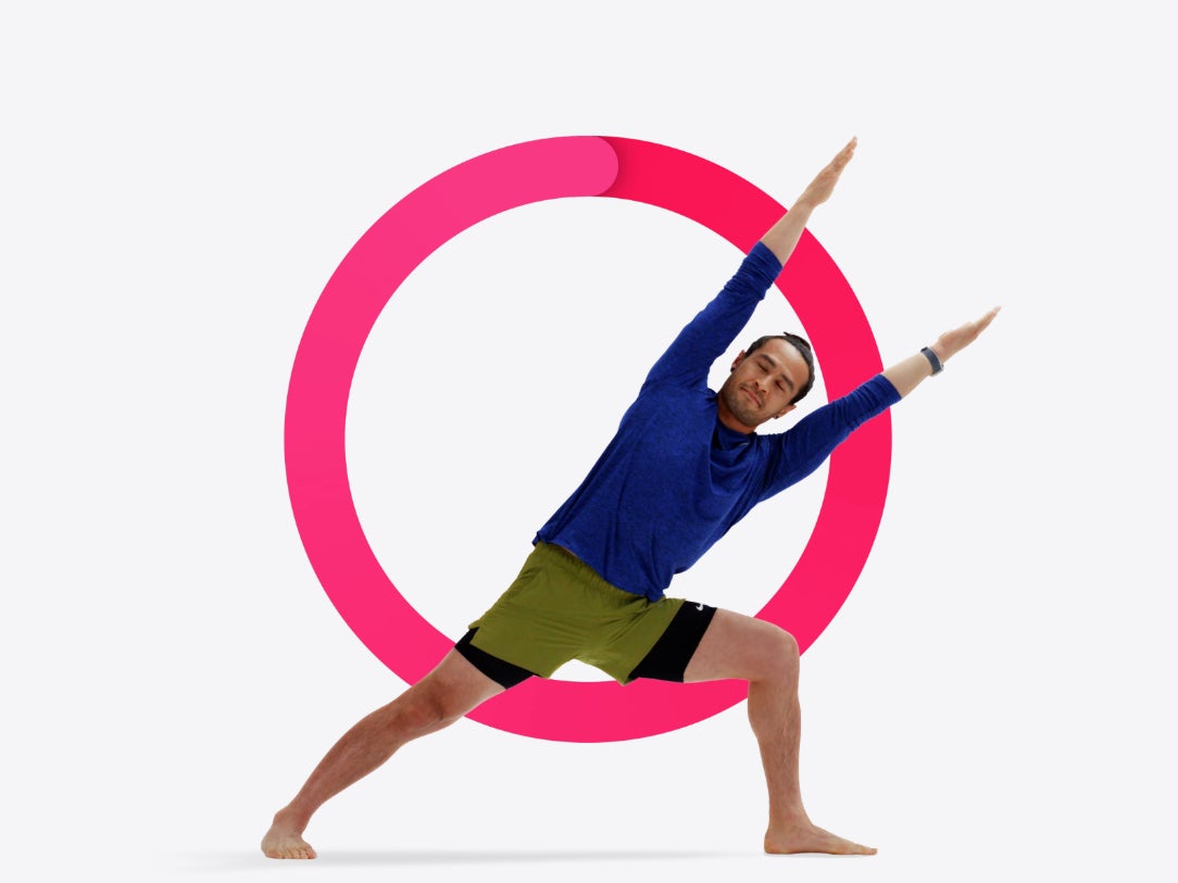 A person stretching using Apple Fitness+